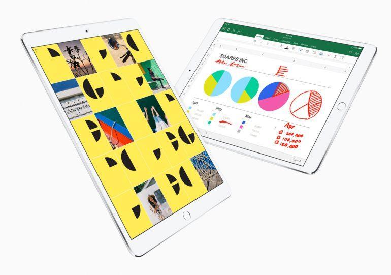Планшеты iPad Pro с ярким интерфейсом и графиками