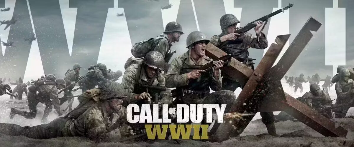 Боевые солдаты в сражении с оружием на пляже в игре Call of Duty WWII