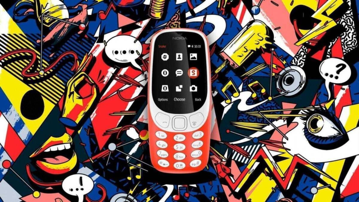 Кнопочный телефон Nokia 3310 на ярком графическом фоне