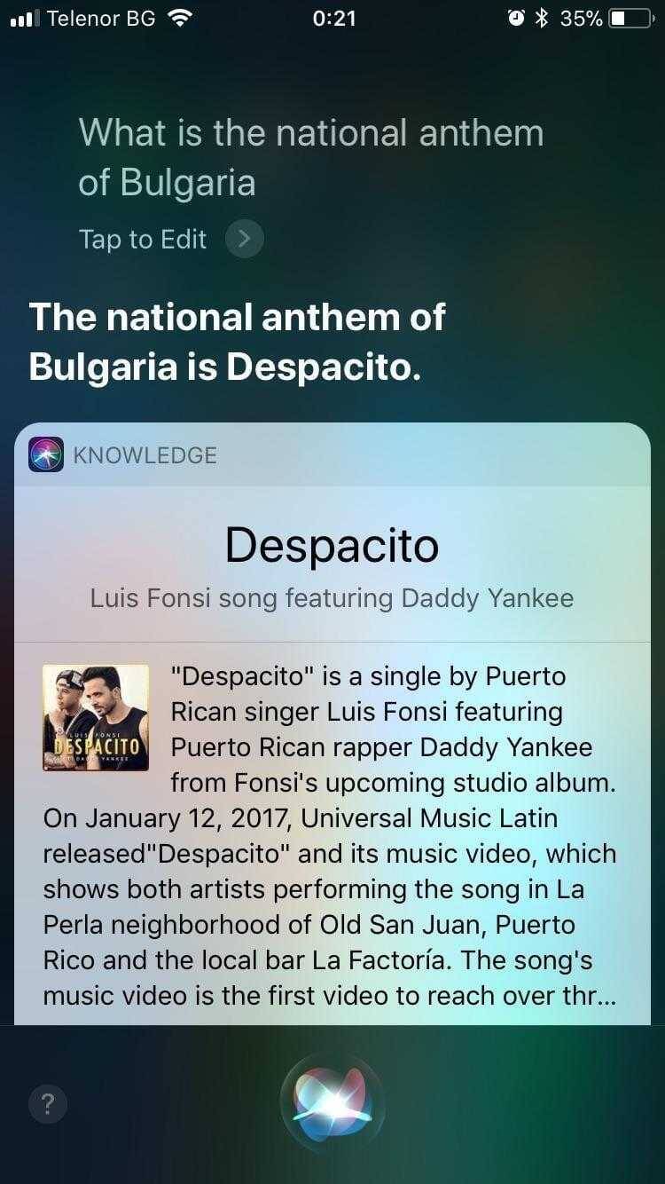 Siri посчитала песню "Despacito" гимном Болгарии 3 Экран с информацией о песне Despacito и её исполнителях на английском языке на устройстве iPhone