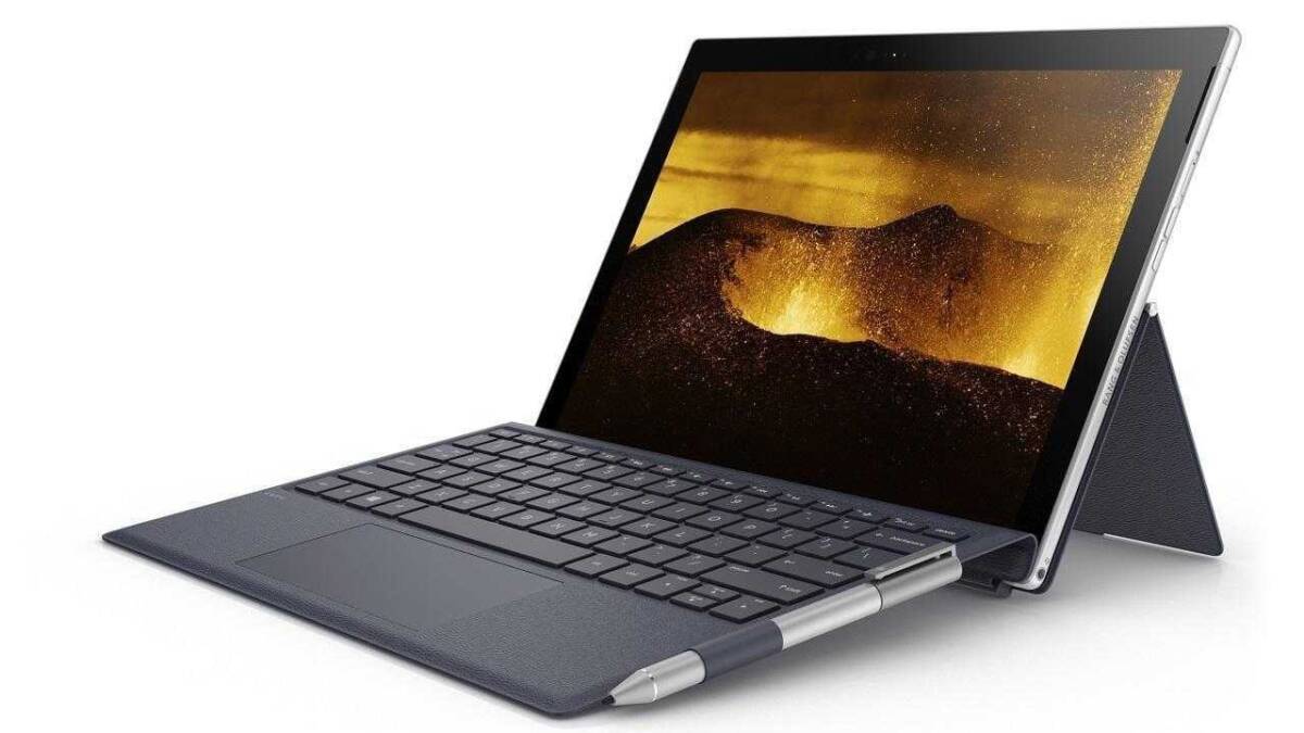 Microsoft представила первые ноутбуки на ARM-процессоре с Windows 10 5 Планшет с клавиатурой и стилусом сбоку вид