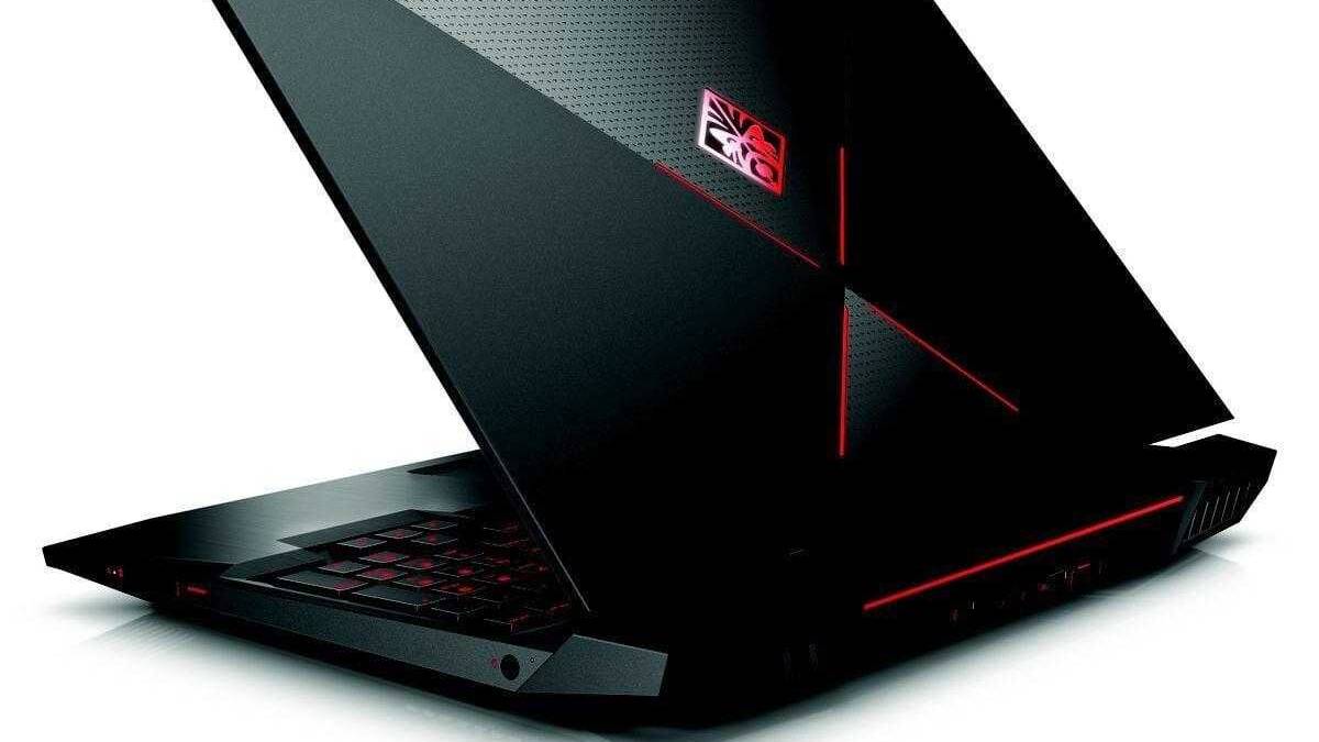 Игровой ноутбук HP Omen X под углом с красной подсветкой клавиатуры и вентиляционными решетками