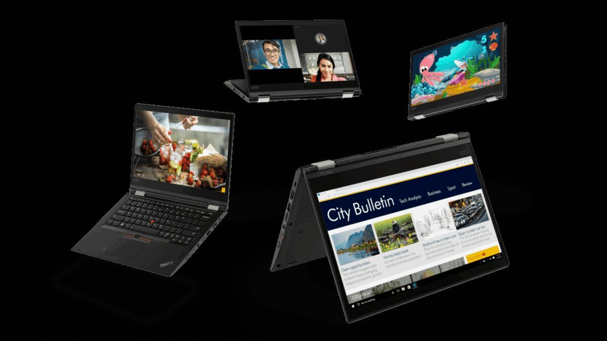 Развернутый ноутбук Lenovo ThinkPad X1 Yoga с дисплеем, стикеры и клавиатура