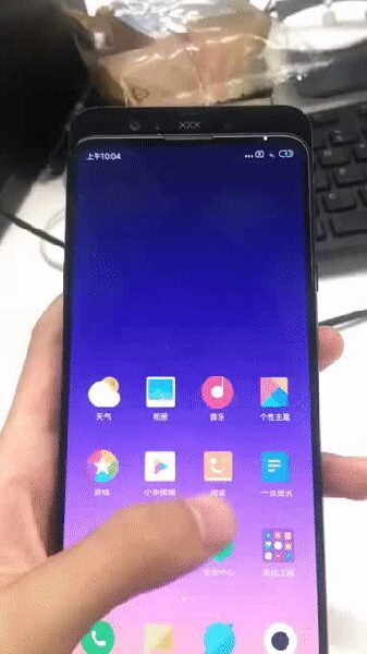 Смартфон Mi Mix 3 с отображением интерфейса и иконками приложений