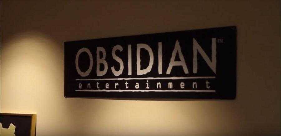Вывеска Obsidian entertainment на стене в офисе