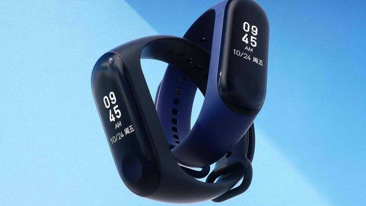 Ультрасовременные умные часы Mi Band 3 на синем фоне
