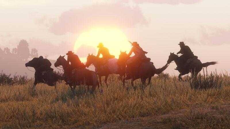 Rockstar выпустила бету Red Dead Online 4 Группа ковбоев на лошадях на закате в игре Red Dead Online