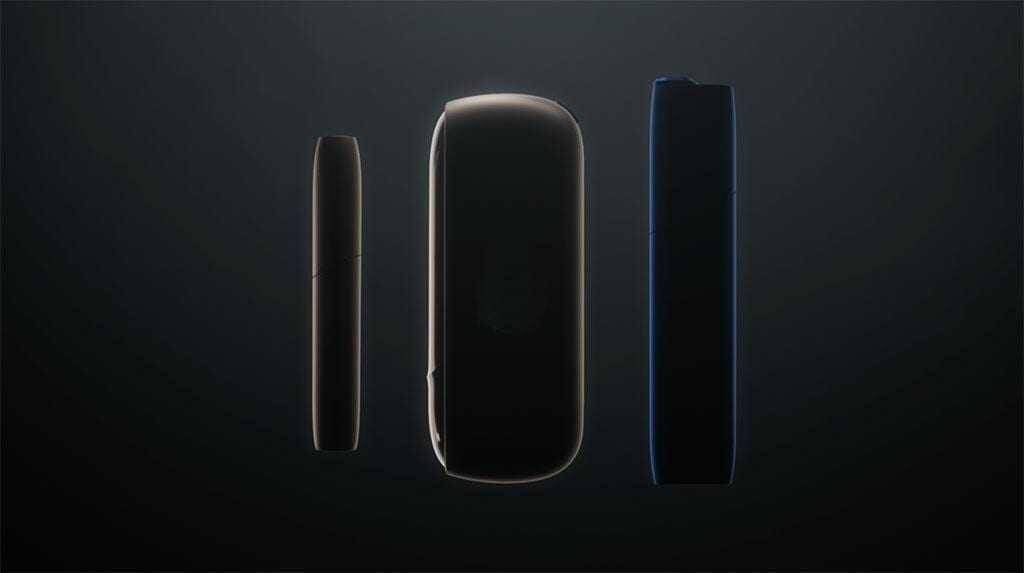 Три устройства IQOS 3 и IQOS 3 Multi на черном фоне