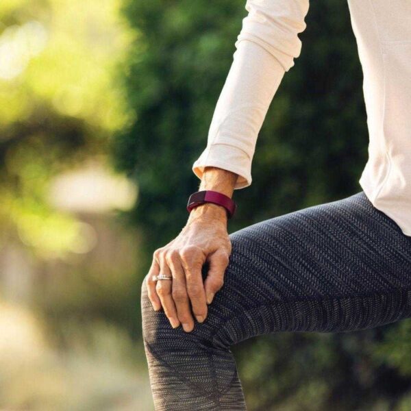 fitbit inspire lifestyle grandparents sidewalk girl stretching 075