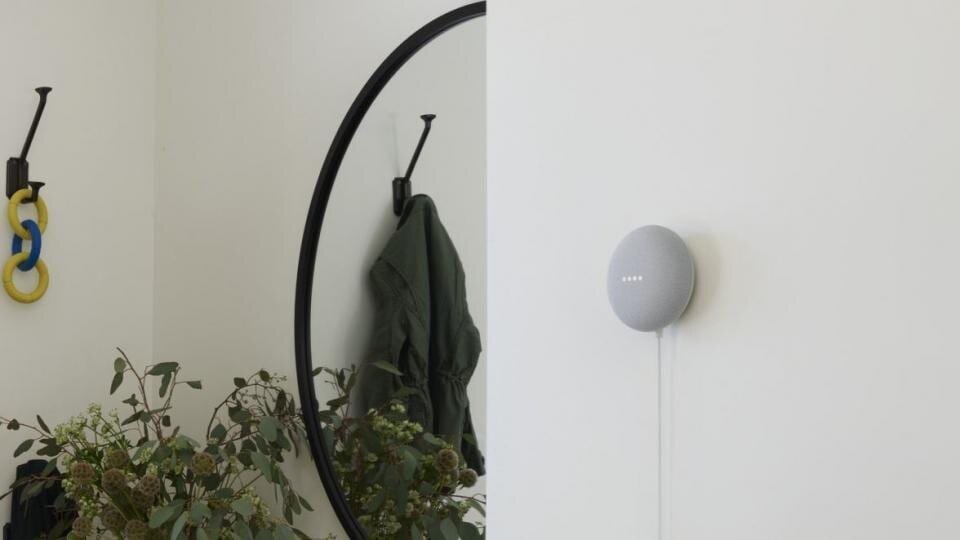 google nest mini on wall