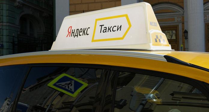 Яндекс.Такси запустил первый в России "Эко-тариф" 2 Такси Яндекс Такси с жёлтым кузовом и логотипом на крыше