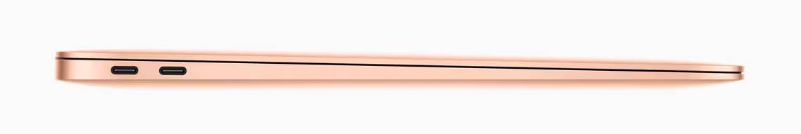Apple выпустила новый MacBook Air и Mac mini 7 Современный городской офис с высотными стеклянными зданиями отражение неба и людей на территории