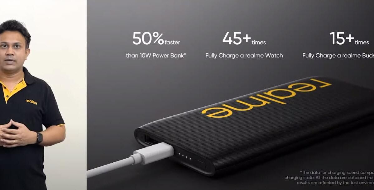 Портативное зарядное устройство realme с кабелем сбоку и индикаторными светодиодами