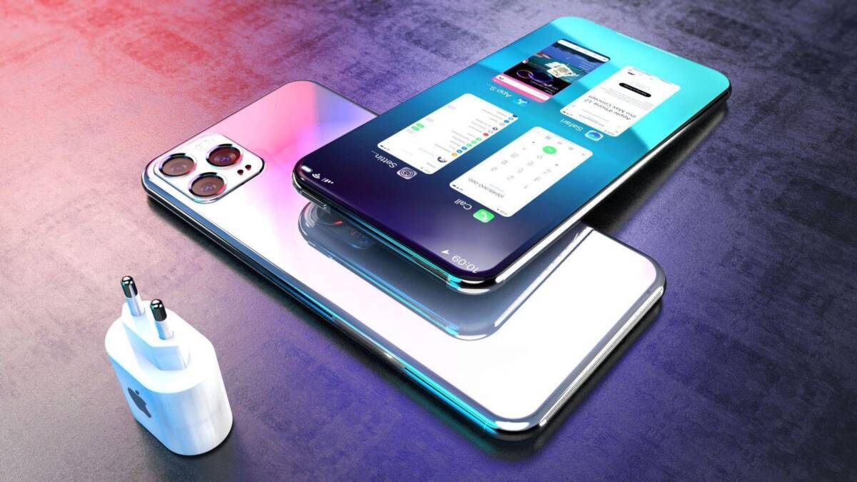 iPhone 12 и зарядное устройство на столе
