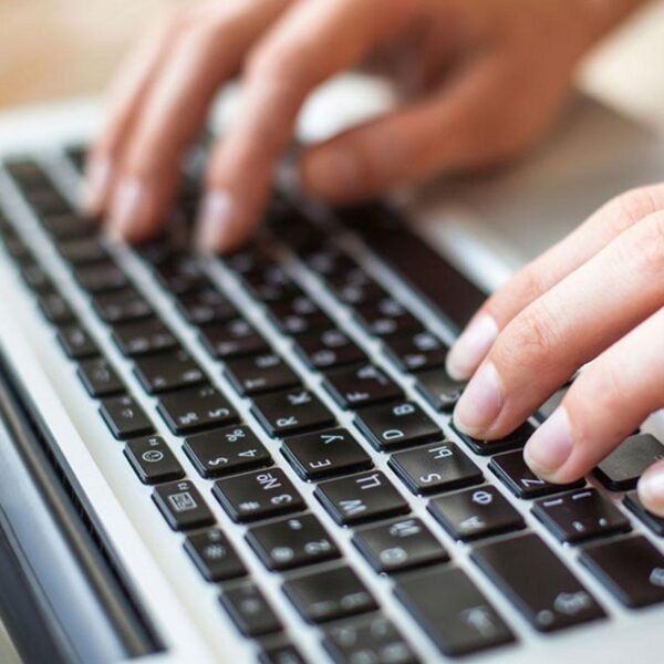 hands-keyboard-laptop-computer