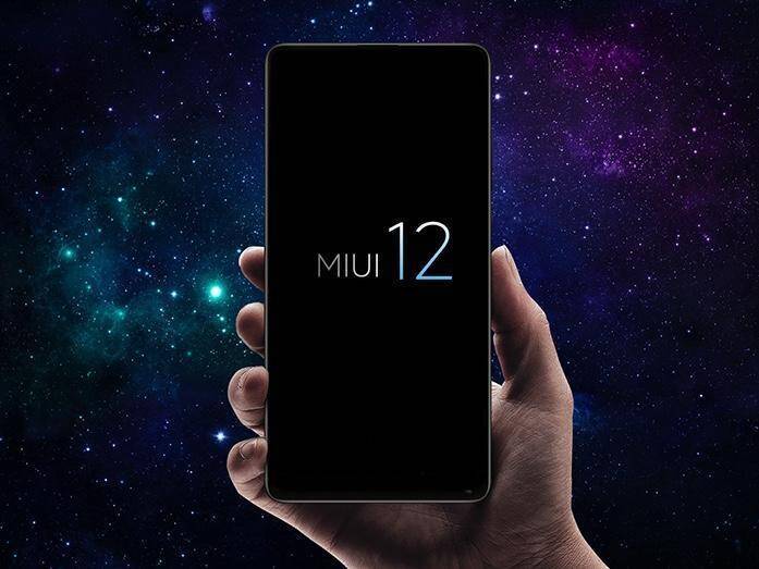 Xiaomi выпускает три закрытые бета-версии MIUI 12 за неделю 4 Манипулятор с смартфоном Xiaomi Mi Band 5 на фоне звездного неба