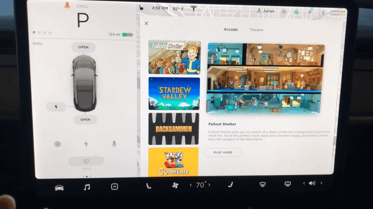 Экран Tesla с интерфейсом игры Fallout Shelter в центре