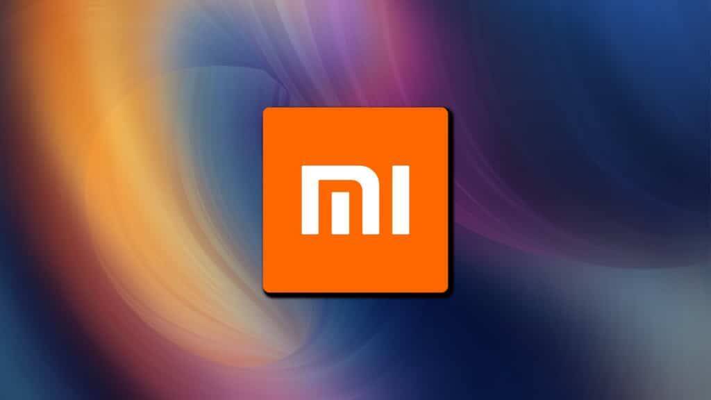 Логотип Xiaomi на фоне синих и оранжевых цветовых градиентов