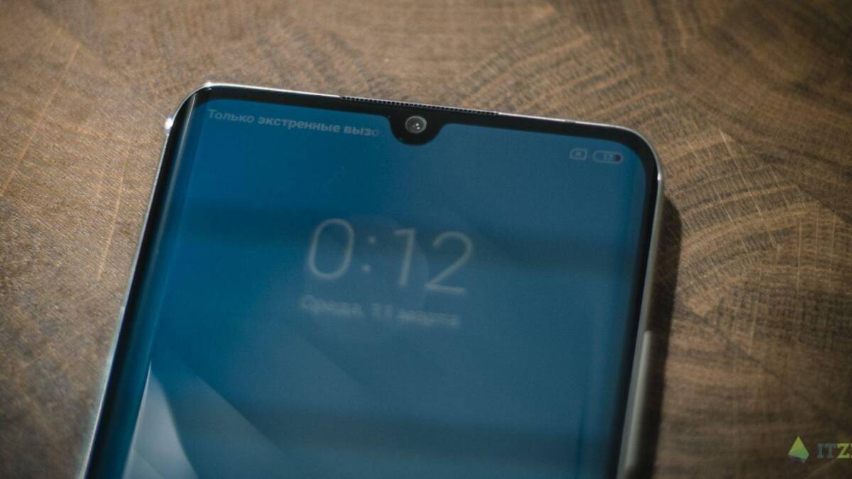 Экран Xiaomi Mi Note 10 Pro с темным интерфейсом и временем 0:12