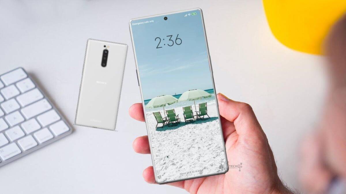 Смартфон Sony Xperia 5 II в руке на рабочем столе