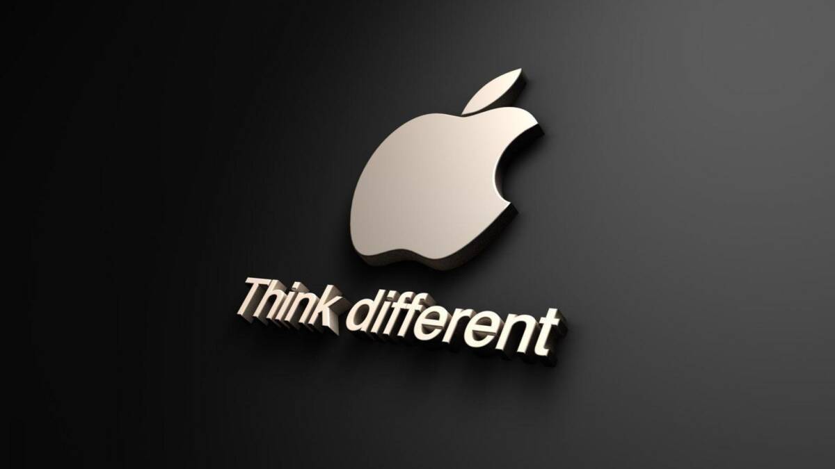 Тёмный фон с металлическим логотипом Apple и текстом Think different