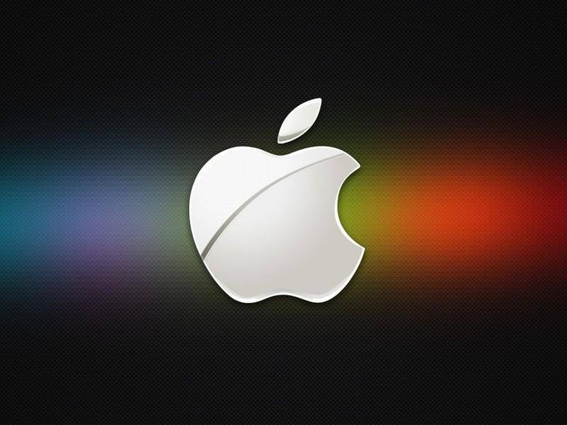 Логотип Apple на сером фоне с цветным световым эффектом