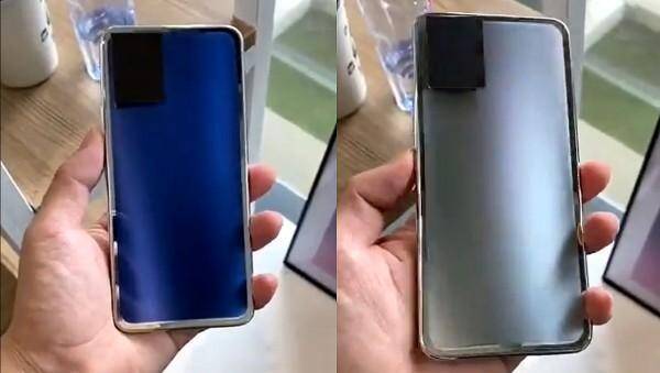 Смартфон Vivo с изменением цвета задней панели в руке