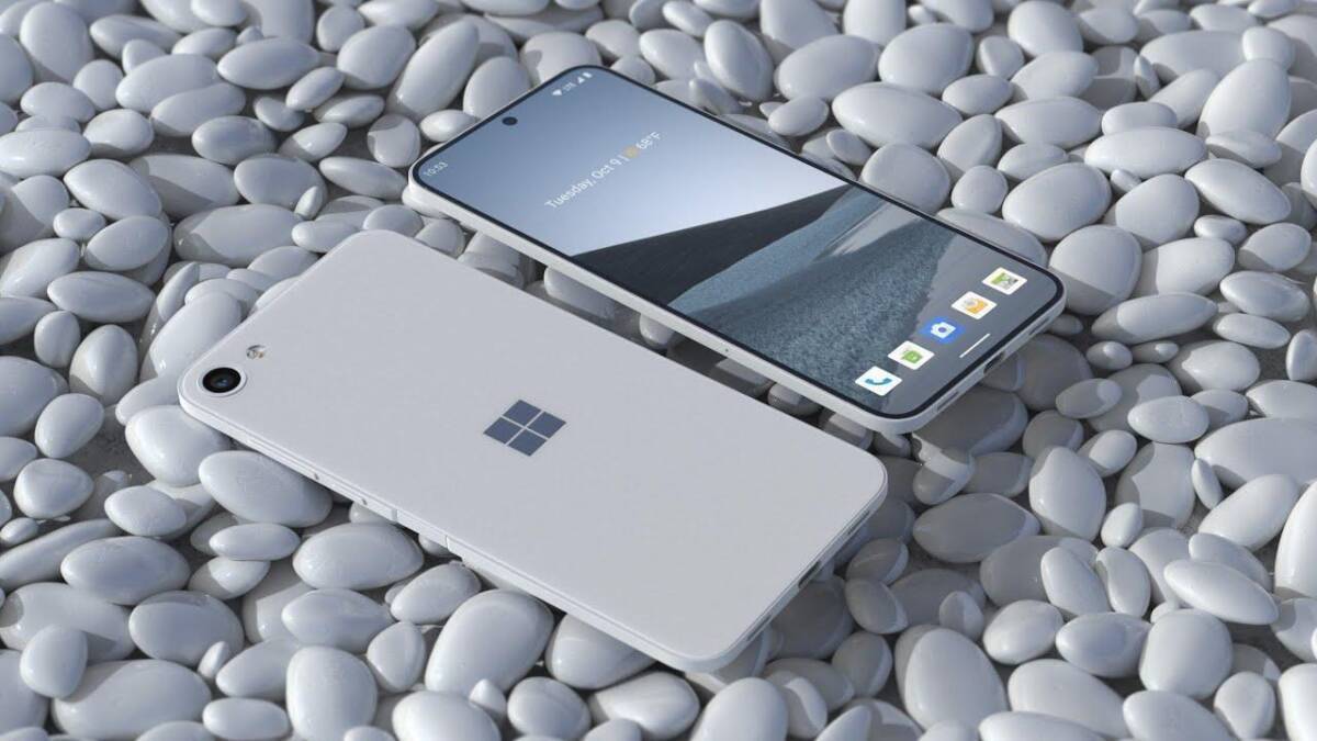 Белый смартфон Microsoft Surface Solo на белых камнях