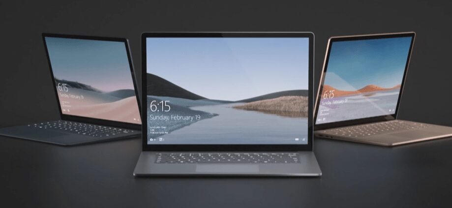 Три ноутбука Samsung Galaxy Book на черном фоне