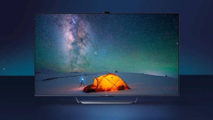 OPPO представит свой первый смарт-телевизор 19 октября 7 умный телевизор OPPO на фоне ночного неба с палаткой и звездами