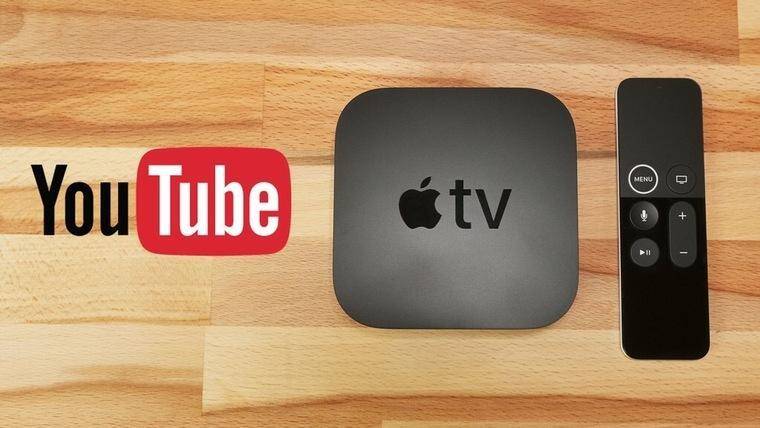 Apple TV 4K с пультом дистанционного управления на деревяной поверхности