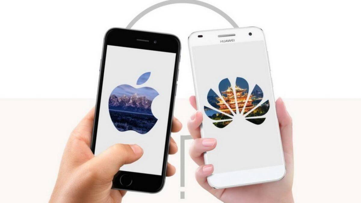 Два смартфона Huawei Mate 40 и iPhone 12 с логотипами на экранах