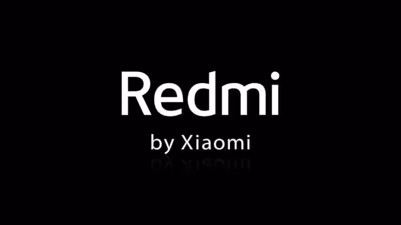 Черный экран с белым текстом Redmi by Xiaomi на фоне