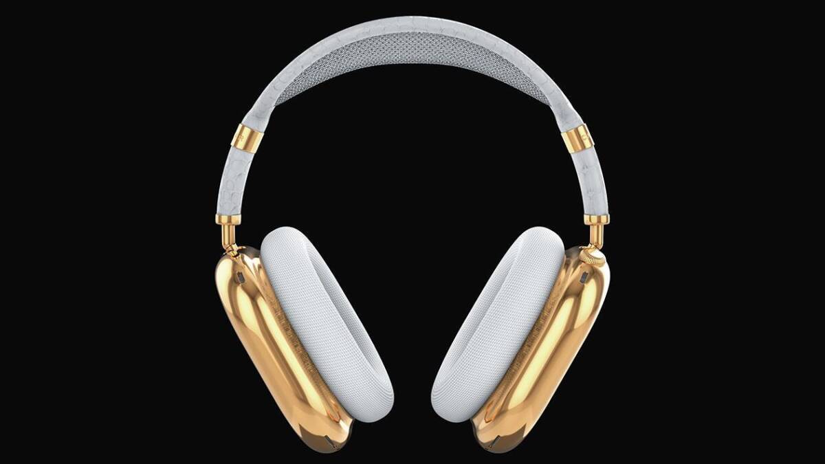 Крупный изображение наушников AirPods Max с золотыми акцентами