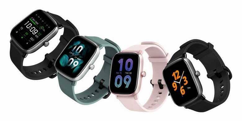 Четыре смарт-часа Amazfit GTS 2 в разных цветах с интерфейсами