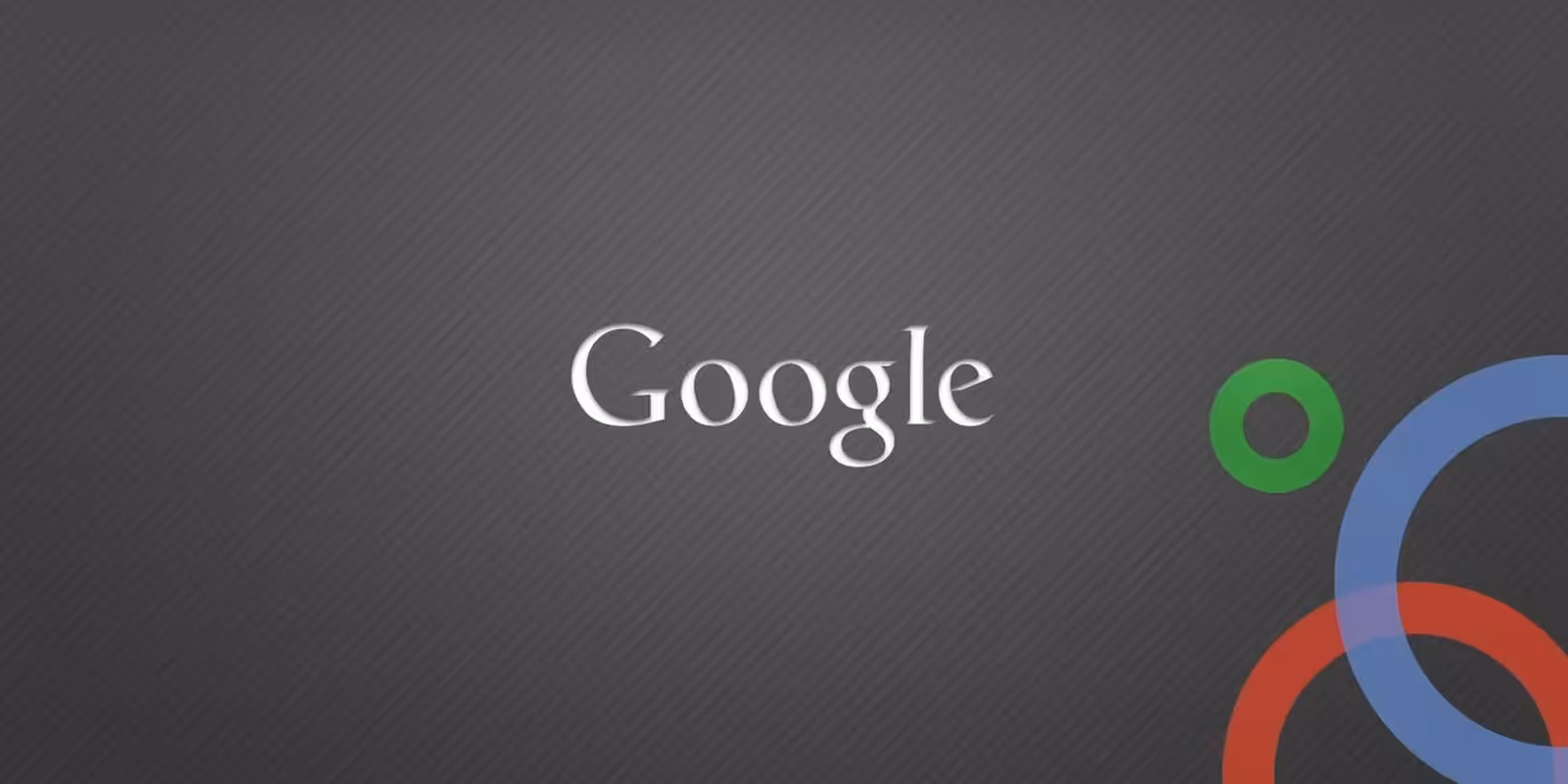 Экран компьютера с логотипом Google и графическими кольцами