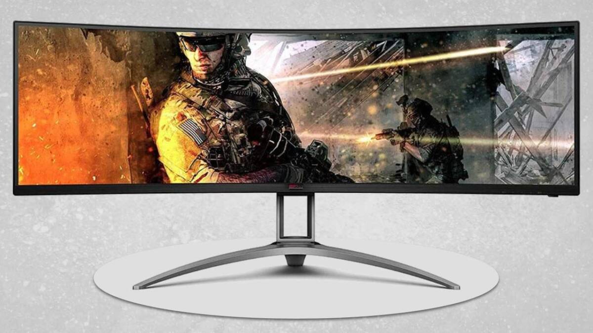 Игровой монитор с широким экраном и изображением стрелялки