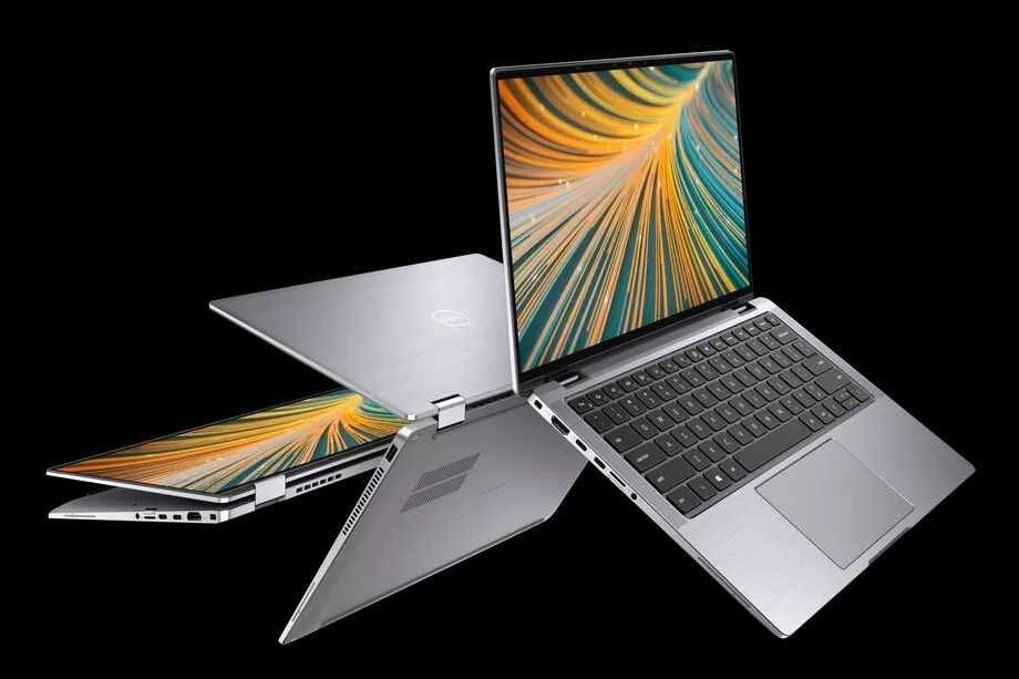 Два ноутбука Dell с изогнутыми экранами и клавиатурами под ними