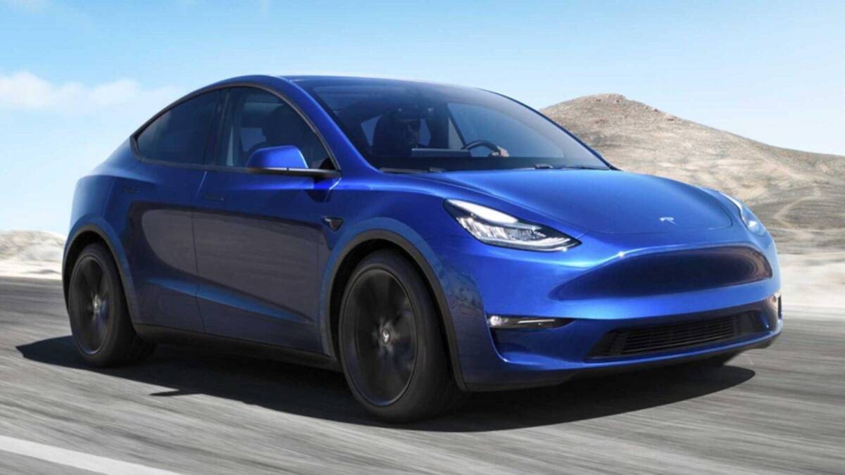 Tesla перестала продавать свой самый дешёвый электромобиль всего через месяц после его релиза 2 Электромобиль Tesla Model Y с задним приводом на пляже