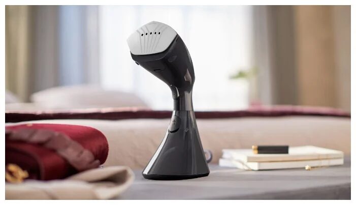 Philips представила новые ручные отпариватели 4 Космолет с изображением собаки в шлеме рядом с ракетой