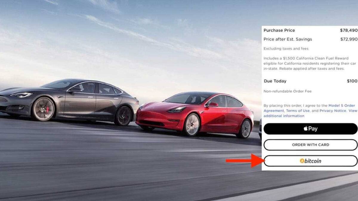 Илон Маск объявил о возможности покупки автомобилей Tesla за биткоины 3 Экран выбора оплаты за Tesla с опцией биткоина
