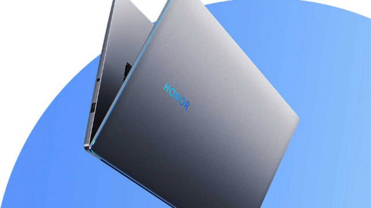 Ноутбук Honor MagicBook с закрытой крышкой и синим подсветом