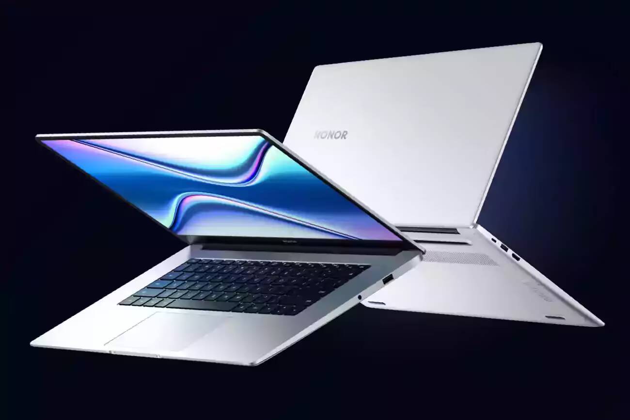 Honor выпустила новые версии ноутбуков MagicBook X 14 и MagicBook X 15 1 Ноутбуки Honor MagicBook X 14 и X 15, раскрытые, вид сбоку