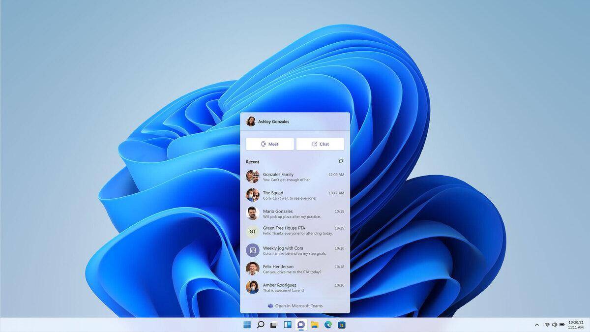 7 новых функций Windows 11, которых мы не ожидали 9 Экран блокировки Windows 11 с окнами чатов и контактов