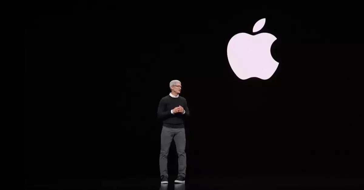 Презентация Apple: крупный логотип на экране и спикер на сцене