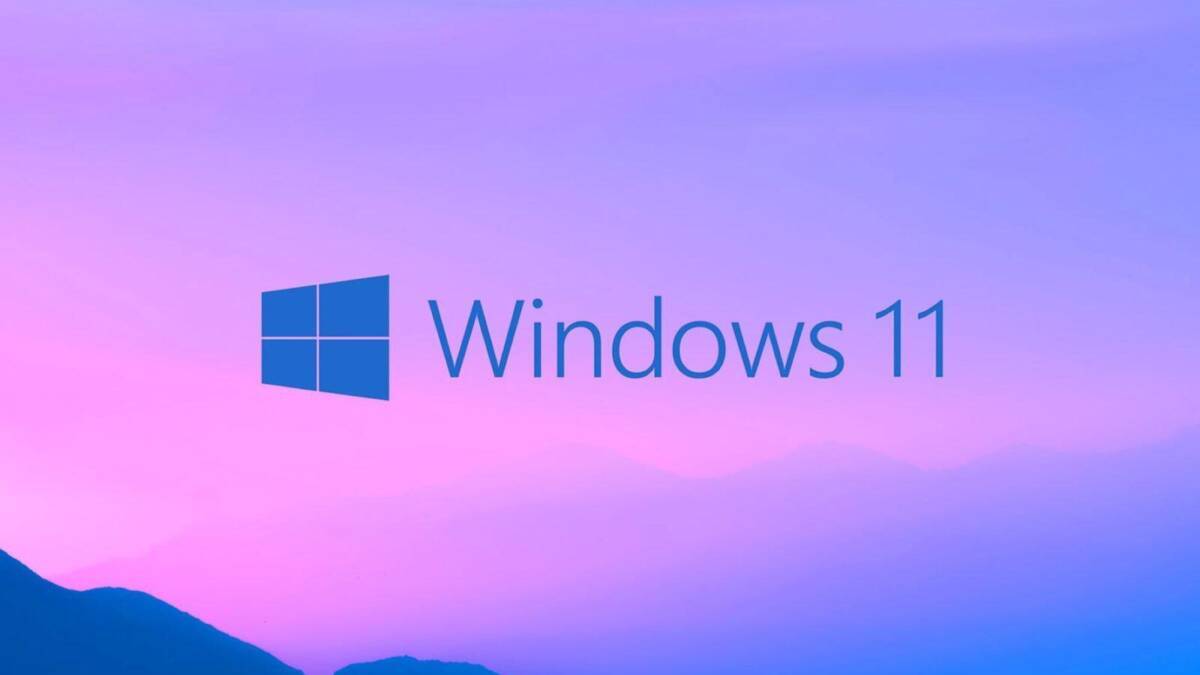 Обложка с логотипом Windows 11 на фоне гор под пурпурным небом