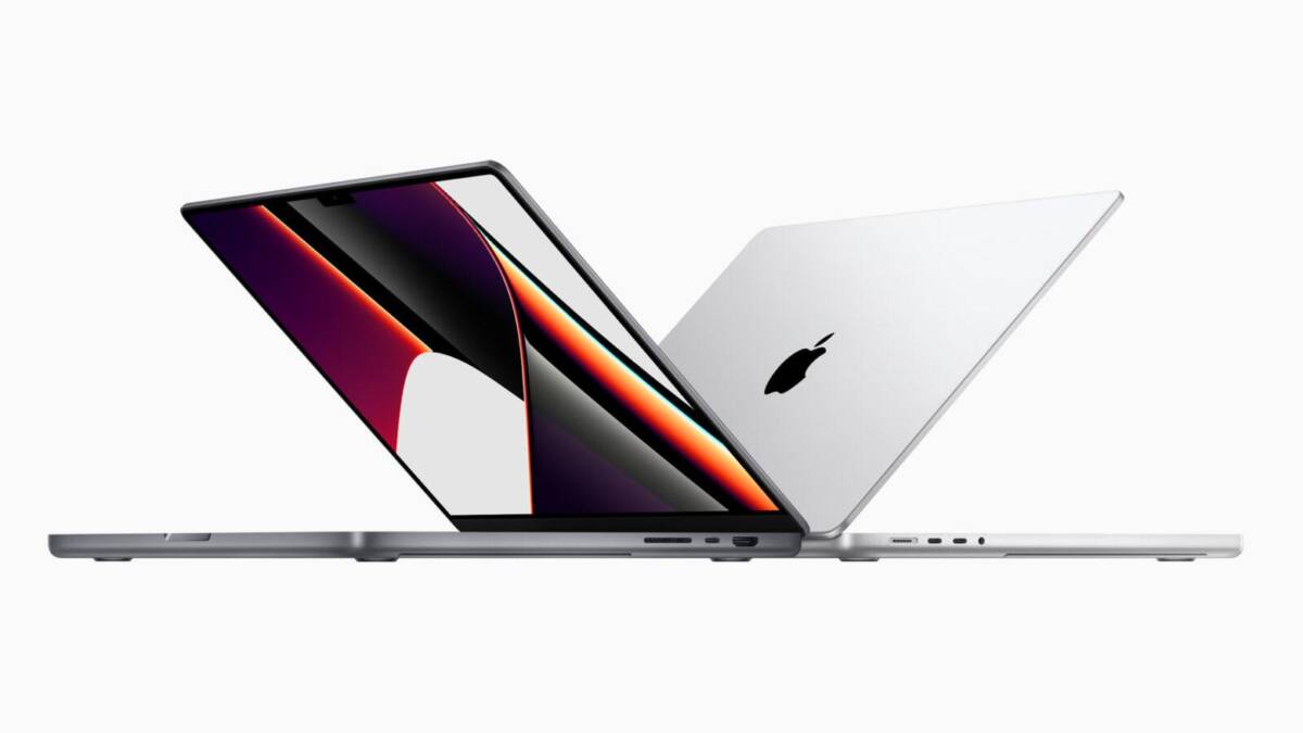 Apple представила MacBook Pro 14 и 16 с процессорами M1 Pro и M1 Max 11 Два новых MacBook Pro 14 и 16 с открытыми крышками