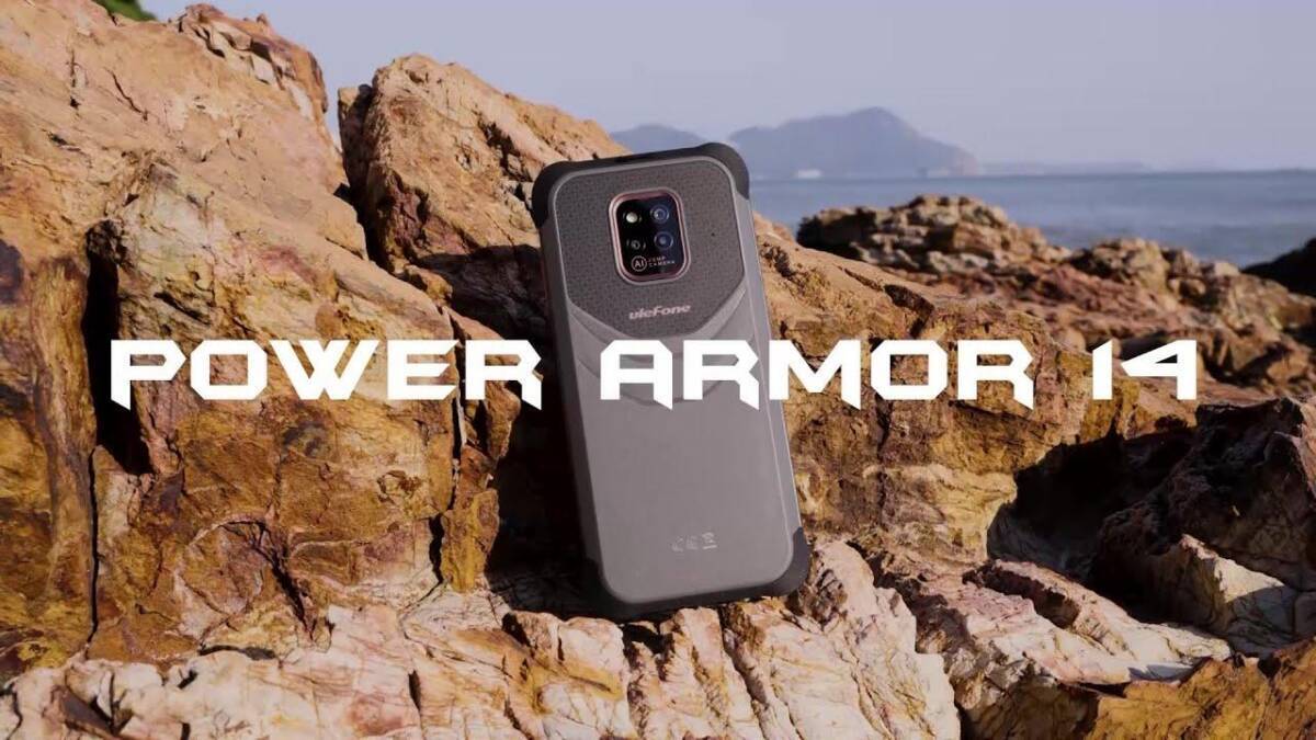 Смартфон Ulefone Armor 14 на каменистом фоне с морем