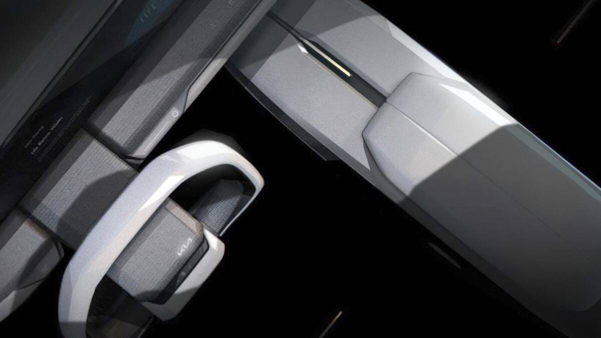 Передняя часть автодизайна Kia EV9 с решеткой и светотехникой