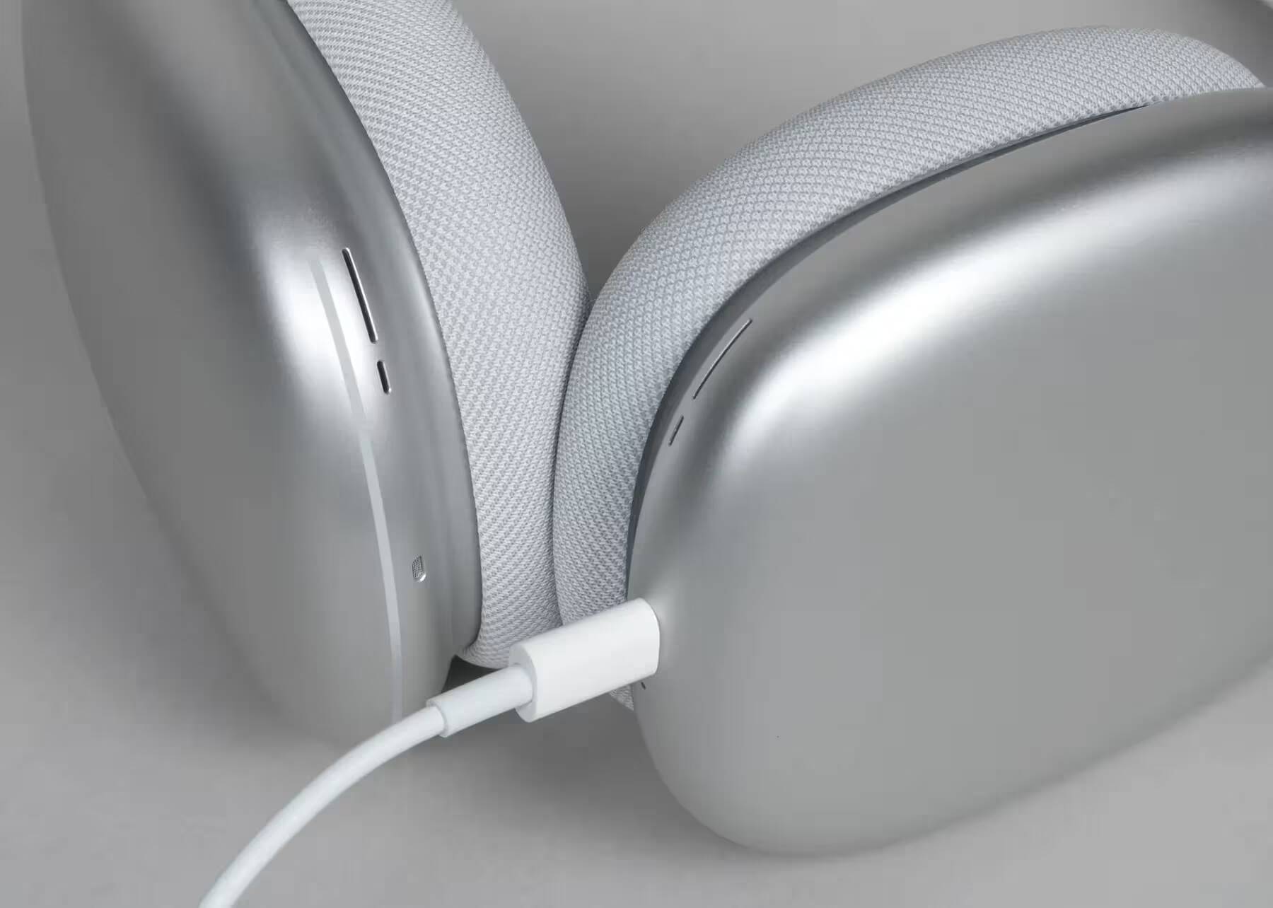 Apple выпустит AirPods Max 2-го поколения во втором полугодии 2024 года 2 Беспроводной динамик на деревянной поверхности с книгами и ваза